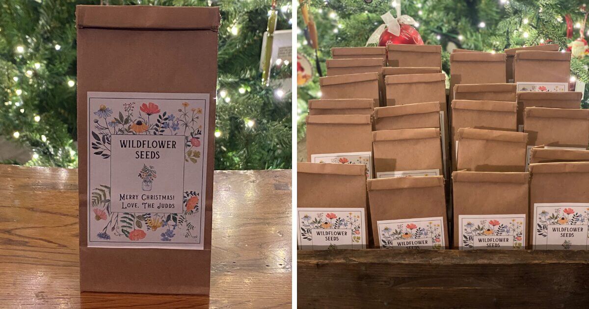 Two photos: one close-up of a Wildflower Seed Packet labeled “Wildflower Seeds, Merry Christmas, Love, The Jones,” and another showing these charming neighbor gifts arranged on a wooden table in front of a glowing Christmas tree.